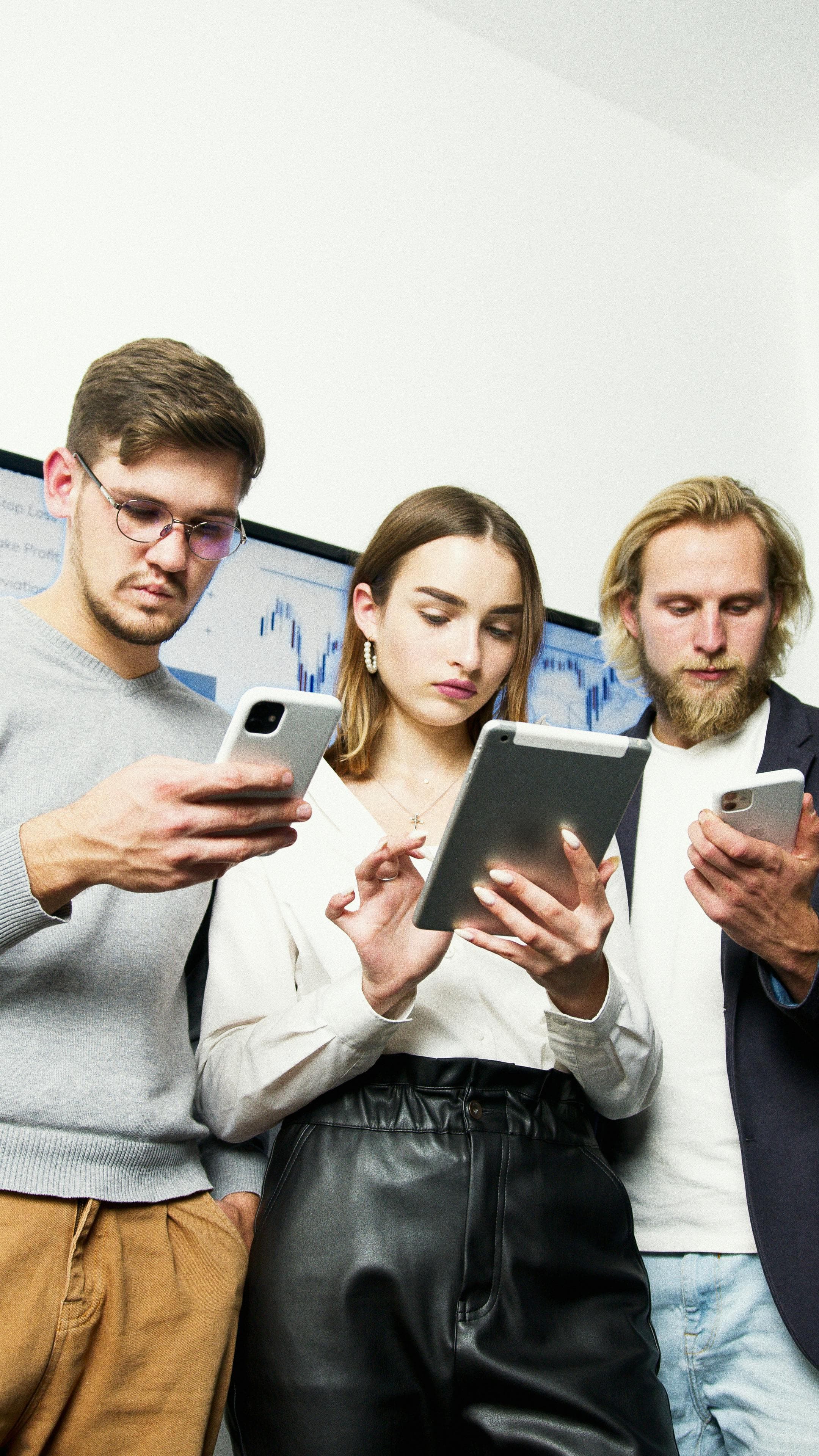 Fashion professionals using mobile devices